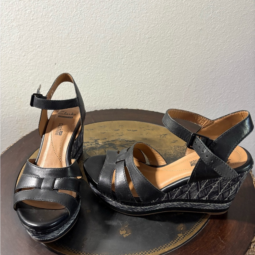 Clarks Black Wedge Sandals with Ankle Strap and Open-Toe Design